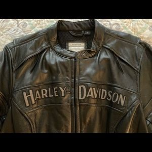 Like new reflective ladies heavy leather riding jacket worn a couple of times.